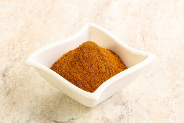 Dry Paprika powder in the bowl