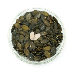 Peeled pumpkin seeds in a bowl on a white background, healthy organic from the garden, photo from the series