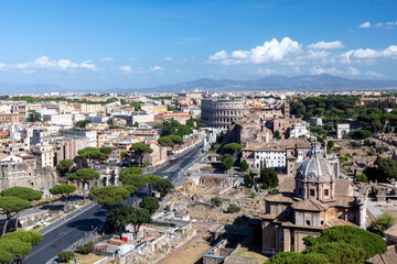 spectacular view to skyline of Rome with colloseum and via dei fori imperiati and roman forum