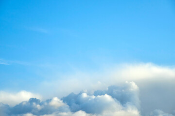 Naklejka na ściany i meble Beautiful sky with white clouds. Lovely background