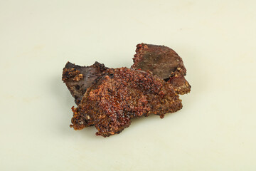 Roasted pork liver steak isolated