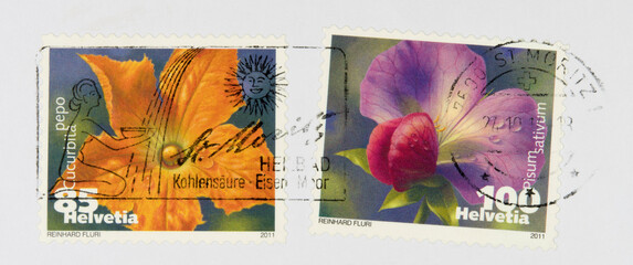 briefmarke stamp vintage retro gestempelt used frankiert cancel blumen flower slogan werbung schweiz helvetia orange lila st moritz heilbad kohlensäure eisen moor sonne sun Gartenkürbis Erbse