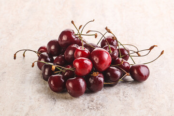 Ripe sweet cherry berries heap