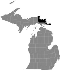 Black highlighted location map of the Chippewa County inside gray map of the Federal State of Michigan, USA