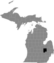 Black highlighted location map of the Genesee County inside gray map of the Federal State of Michigan, USA