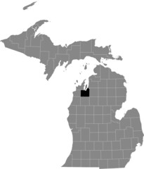 Black highlighted location map of the Grand Traverse County inside gray map of the Federal State of Michigan, USA