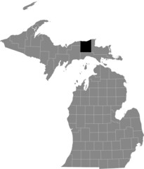 Obraz premium Black highlighted location map of the Luce County inside gray map of the Federal State of Michigan, USA