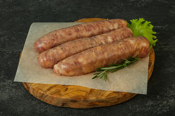 Raw pork meat sausages for grill