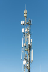 Communication antenna on top of a mountain.