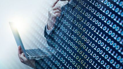 Abstract background of digital binary code of software. Programming software code on computer screen which develop by the programmer to solve the business requirement.