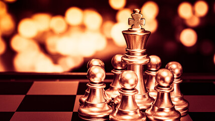 Closeup of chess characters on board games. to represent decision making in term of business strategy to find out the best solution to meet target objective and goal.	
