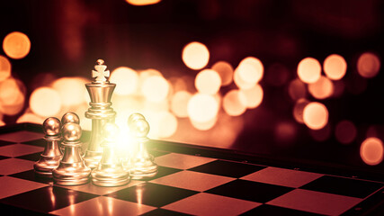 Closeup of chess characters on board games. to represent decision making in term of business strategy to find out the best solution to meet target objective and goal.	
