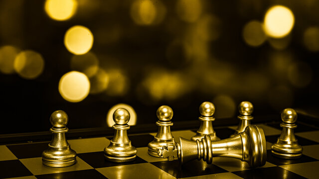 Closeup of chess characters on board games. to represent decision making in term of business strategy to find out the best solution to meet target objective and goal.