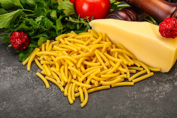 Italian pasta raw Maccheroni for cooking