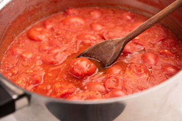 A fresh home made tomato sacue in a pan