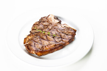 grilled beef fillet steak meat with rosemary isolated on white background