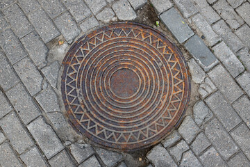 manhole cover in the street