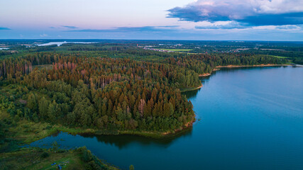 Fototapeta na wymiar Wonderful sunset over Vodokhranilishche on Ruza river, Moscow Oblast, Russia Aerial or drone view