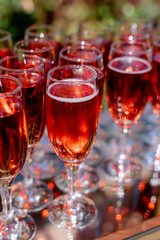 Drinks for guests Alcohol in glasses at the wedding Party of the bride and groom