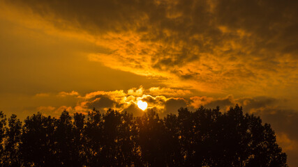 Obraz premium sunrise with orange sky early summer morning landscape