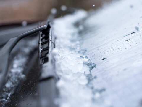 Icy hail snow on car windshield