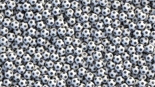 Fototapeta Soccer balls background. Many classic black and white football balls lying in a pile. High resolution 3d render
