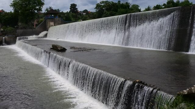 waterfall flow at the tukad unda dam, Bali