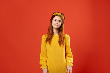 woman in yellow sweater studio street style retro decoration