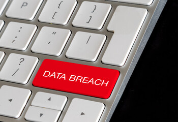 Security concept data breach key on computer keyboard  cyber attack stealing data via...