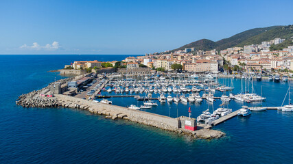 Fototapeta na wymiar Aerial view of the port of Ajaccio in Corsica - Yachts moored in the center of the capital city of this French island in the Mediterranean Sea