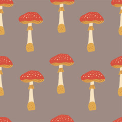 Vector autumn seamless pattern with amanita. Repeated texture with natural elements for fall season. Forest background. For scrapbooking, fabric, wrapping paper, notebook covers.