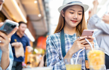 Traveler Asian woman friend travel in Bangkok, Thailand, sweet couple taking photo . Lifestyle...