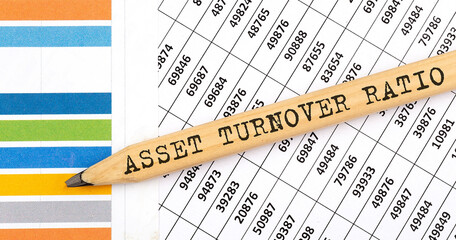 Business concept. ASSET TURNOVER RATO text on the pencil on chart background