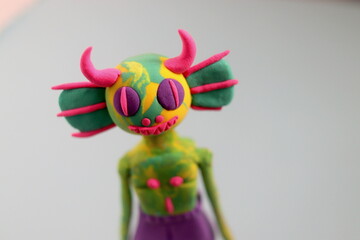 plasticine figurine in the shape of a fictional character from a fairy tale or cartoon