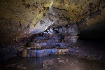 Underground cave refracted by headlights