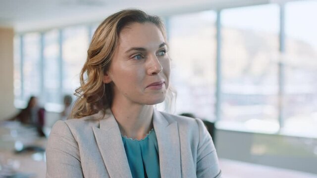 portrait beautiful business woman executive smiling looking confident thinking of future planning ahead female entrepreneur enjoying leadership proud manager in office boardroom 4k