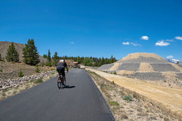 Obraz premium Biking along Mineral Belt Trail of the remnants of 1880s Leadville mines, a loop through Leadville, which is tucked into the Rocky Mountains of central Colorado., USA.