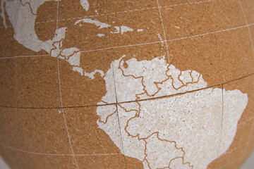 World cork ball showing Cuba, Dominican Republic, Costa Rica, Panama, Colombia, Ecuador, Peru, Venezuela and Brazil, in white color, background - Plan destinations - Places visited - Next destinations