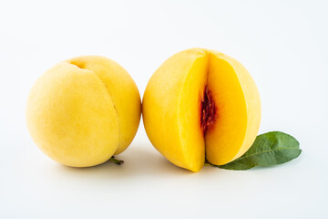 Red heart yellow peach cut on white background