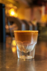 Specialty coffee menu; Dirty coffee is ristretto pouring from coffee machine into cold milk.