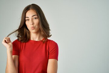 Obraz premium woman in white t-shirt smile studio posing glamor
