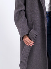 Coat, raincoat, trench-autumn clothes on a white background 