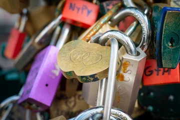 Foto auf Leinwand Love locks hang on the Staalbrug over the Groenburgwal in Amsterdam, Noord-Holland Province, The Netherlands © Holland-PhotostockNL