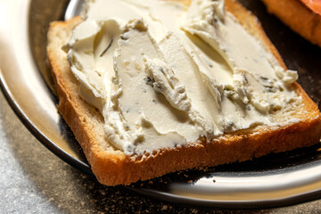 Sandwich with curd cheese, greens on wheat toasted bread