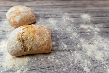 bread roll on a grey wooden table