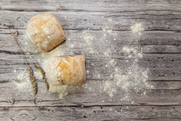 bread roll on a grey wooden table