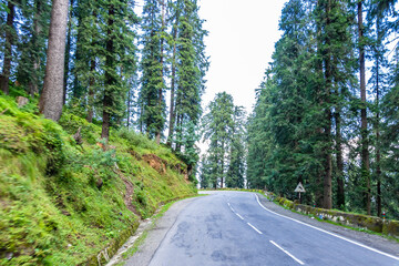 View from hilly mountain road travelling through Himalayas mountains near Narkanda, Himachal...