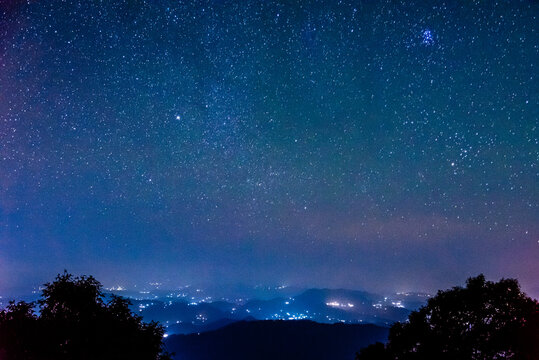 Starry night and Milky way galaxy long exposure grainy night shoot at Binsar, Uttarakhand, India.