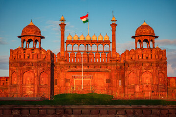 Red Fort is a historic fort UNESCO world Heritage Site at Delhi. On Independence day, the Prime Minister hoists Indian flag at main gate of fort and delivers nationally broadcast speech.