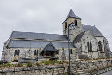 Fototapeta na wymiar Saint-Martin Church (or Saint-Lezin Church, XVI - XIX centuries) - Catholic Church in Blosseville. Blosseville-sur-Mer - commune in Seine-Maritime department, Normandy region in northwestern France.